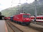 Noch mit den alten Glacier- und Speisewagen ist am 12.07.2005 die MGB HGe 4/4 Nr. 3 in Andermatt unterwegs. Auf ihrer Fahrt mit D 908 Zermatt-St. Moritz hat sie schon mehr als die Hlfte geschafft, whrend fr den angehngten Wagenzug noch keine Halbzeit ist.