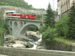 MGB Zug ex.Schllenenbahn (Sch.B.) von Andermatt kommend kurz vor dem Bhf.Gschenen beim berqueren der Reuss.02.06.07