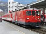 MGB - Zahnrad E-Lok Deh 4/4  91 mit Personenwagen im MGB Bahnhof von Brig am 10.03.2007
