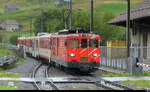 MGB - Deh 4/4  93 mit Regio bei der einfahrt in den Bahnhof Hospental am 26.07.2026