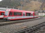 Der Zermatt Shuttle (Tsch-Zermatt), Nr. 2052 (noch in den alten BVZ Farben), steht abseits seines Einsatzgebietes abgestellt in Andermatt. Wegen Bauarbeiten zwischen Brig und Mrel verkeht im Goms ein Komet (Triebzug). Gleichzeitig wurde auch der Zug im Bild nach Andermatt berfhrt, wo er fr Lokfhrer-Fahrzeuginstruktionen herhalten muss, 08.11.2011.