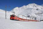 Nachdem der Deh 4/4 I 23 am 21.02.2016 den Autozug aus Sedrun nach Andermatt gebracht hatte, übernahm er den Regio 844 nach Disentis. Das Bild wurde in den Kehren unterhalb von Nätschen aufgenommen.