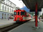 R 348 (Zermatt - Visp - Brig Bfpl. - Fiesch) am 23.7.2015 bei der Einfahrt in den Bahnhof Brig Bahnhofplatz.