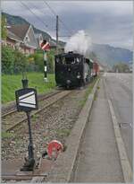 Die BFD HG 3/4 N° 3 der Blonay Chamby Bahn erreicht mit ihrem Dampfzug von Chaulin kommend ihr Ziel Blonay.