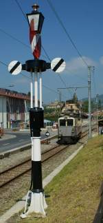 Das Ausfahrtssignal zeigt  Freie Fahrt  und der LLB Triebwagen verlsst Blonay Richtung Chamby. 
22. Mai 2010