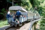 BC Museumsbahn Paradezug 10083 von Blonay nach Chamby am 23.05.1999 kurz nach Viadukt mit Triebwagen exLLB ABFe 2/4 10 - exLLB AB4 22 - exLLB L 60.