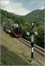 Das Einfahrsignal von Blonay zeigt  freie Fahrt  und so kann der B-C Dampfzug in den Bahnhof eindampfen. 
27. Mai 12 