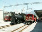 Tag der offenen Tr der DFB Werkstatt in Chur.Soeben kam die RhB Dampflok G4/5 No.107 mit einem Extrazug der Furka Dampfbahn aus  Kblis in Chur an.Links ein Pendelzug,rechts die FO HGe 4/4 I
