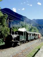 FM Dampfextrazug V3214 fr GRAUBNDEN TOURS von Castione-Arbedo nach Cama vom 29.08.1997 bei der Durchfahrt in der Station Leggia mit Dampflok G 3/4 1 - B 2060 - A 1102 - B 21.