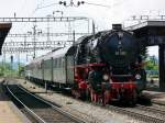 Alles wartet auf die Weiterfahrt nach Chur/Graubnden mit dem Sonderzug der Ulmer Eisenbahnfreunde mit Lok 01 202 im Bhf.