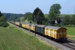 SBB/PTT: Re 4/4 11166 mit Postwagen ab dem Postverteilungszentrum Härkingen nach Daillens.