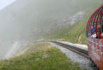 Blick aus dem offenen Panoramawagen: wir fahren in den Nebel etwas unterhalb der Bergstation (2244 m�M). Brienz - Rothorn, 20.7.2026