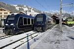 Der GPX Zug 3  Gstaad  nach Montreux nach dem er los gerollt ist, der GPX 2  Interlaken  der nach einer Fahrzeugstörung auf dem Gleis 5 steht und die Re 465 008 mit der Komp 4  Shania Train  der später wieder zurück nach Interlaken fährt, am 26.11.23 im Bahnhof Zweisimmen.