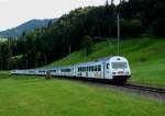 Der Kambly-Zug geschoben von Re 465 004 als RE nach Bern am 26.08.2012 bei Schpfheim.