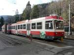 WB - Steuerwagen Bt 113 mit Teilwerbung und Triebwagen BDe 4/4 13 im Bahnhof Waldenburg am 30.12.2012 