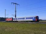 SBB - Schnappschuss eines Steuerwagen St 50 85 89-33 900/901 für den Gafangenentransport auf der Schiene unterwegs bei Lyssach Richtung Burgdorf am 26.02.2015
