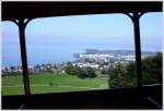 Blick aus einem offenen RHB-Sommerwagen bei Wartensee auf Altenrhein, den Bodensee und das deutsche Ufer.