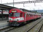 CJ - Triebwagen RBDe 4/4 566 222-6 mit dem Steuerwagen Bt 50 85 80-35 922-4 im Bahnhof von Porrentruy am 31.08.2014