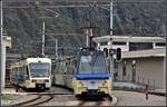ABe 4/4 81 des vierteiligen Treno Panoramico Vigezzo D61 nach Locarno und Centovalli Express ABe 4/8 48 in Domodossola.