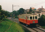 OC: Regionalzug auf der Fahrt nach Chavornay mit dem BDe 4/4 12 vor der Kulisse des Städtchens Orbe im Oktober 1987.