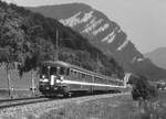 RVT: Hundert Jahrfeier der Regional du Val de Travers.
Der Jubiläumszug auf der Rückfahrt von Neuenburg bei Noiraigue am 27. August 1983.
Foto: Walter Ruetsch