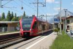 Regio der S12 von Sargans nach Chur bei der Ausfahrt in Maienfeld.16.04.14