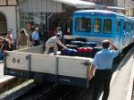 Triebzug mit Kofferwagen in Rigi Klsterli.