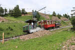 Die Rigi Bahn Dampflok 7 mit ihrem Zug beim Abstieg von Rigi Kulm.