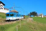 ARB-Züge mit BDhe 4/4 Nr. 15 (vorne, Baujahr 1987) und BDhe 2/4 Nr. 14 (hinten, Baujahr 1967) auf Talfahrt unterhalb Rigi-Staffel, 14. Sept. 2014, 12:12