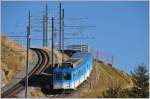 BDhe 2/4 11 und Bt aus Arth-Goldau haben das Ziel auf Rigi Kulm fast erreicht. (18.11.2015)