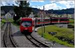S22 2137 nach Appenzell quitscht durch die enge Kurve inGais. BDeh 4/4 15 und ABt 123. Das Gleis links führt nach Altstätten Stadt.(21.09.2014)
