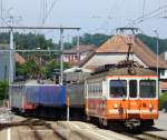 asm ( BTI ) - Tglicher Kisezug mit Triebwagen Be 4/4 523 und 3 Kieswagen ( ex DDR Braunkohlewagen ) sowie der Triebwagen Be 4/4 525 bei der einfahrt in den im Bahnhof von Tuffelen am 30.05.2007