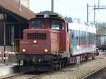 SBB Cargo und asm - Em 3/3 18837 mit dem asm GTW Be 2/6  509 auf zwei Rollschemmel im Bahnhofsareal von Ins am 17.09.2007