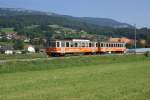 Der Be 4/4 303 und der Bt 352 fahren am 18.8.09 als Regionalzug 433 von Attiswil Richtung Flumenthal.