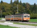 asm Oberaargau - Regio nach Langenthal mit dem Be 4/4 102 und Steuerwagen Bt 151 bei Bannwil am 08.09.2009