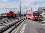 SBB / asm Oberaargau - Am 841 035-9 bei Rangierfahrt und Steuerwagen Bt 112 und Triebwagen Be 4/4 14 (ex FW) beim verlassen des Bahnhof Oensingen am 14.08.2014