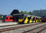 ASm: Regionalzüge bereit zur Abfahrt nach Langenthal und Solothurn mit Be 4/8 114 und dem Be 4/8 110  MERKUR  in Oensingen am 7. Juli 2015.
Foto: Walter Ruetsch