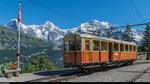 125 Jahre BLM: Der CFe 2/4 11 aus dem Jahr 1913 erreicht am 13. August 2016 die Entstation Grütschalp, wo die Reisenden nach Lauterbrunnen auf die Luftseilbahn umsteigen müssen. Im Hintergrund Eiger, Mönch und Jungfrau.