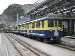 ABeh 4/4 I 308 mit Regio bei Einfahrt in Lauterbrunnen, 15.03.2011.