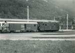 Die alten Lokomotiven der Berner Oberland Bahn - Lok 26: Die schwarze Lok 26 wartet in Interlaken Ost auf Abfahrt; hinter der Lok der damals relativ neue Gepäckwagen F2 48. Sommer 1961. 