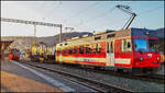 CJ Bf Glovelier__Altbau-Tw 617 mit leeerem N-Spur-Rungenwagen auf Rollwagen.__27-02-2026