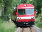 Ein Tiebwagen rollt aus Glovelier am 12/06/10.