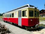 La Traction - Ex. CJ Triebwagen BDe 4/4 601 im Neuen Farben als CFe 4/4 601 vor der Werksttte im Betriebsareal in Pre Petitjean am 21.07.2013