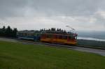 Am Nachmittag wurde nochmals die gleichen Fahrzeuge wie am Morgen gezeigt. Ich wechselte dafr zur Stelle unterhalb von Scheuren, mit dem Greifensee im Hintergrund. Als erstes erschien der Xe 4/4 9 zusammen mit dem C 11. (2.9.12)