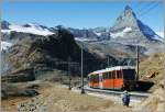 Auch in der fast unendlich weiten Bergwelt gibt es hin und wieder Fotografen die das gleiche Bild wie ich fotografieren mchten...
GGB Zahnradbahnzug kurz vor der Gipfelstation Gornergrat am 04.10.2011.