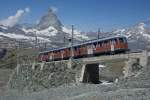 Bhe 4/8 3044 fhrt am 27.07.2013 vom Gornergrat talwrts Richtung Zermatt.