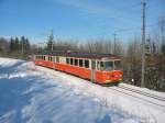 BDe 8/8 2  der Bremgarten Dietikon Bahn im verschneiten Wald zwischen Wohlen und Bremgarten am 31.01.04