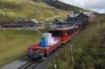 Der Verpflegungsnachschub fr das Jungfraujoch wird am 13.8.11 vom BDhe 4/8 214 bergwrts geschoben.