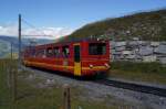 Bt 34 und BDhe 2/4 210 fahren am 13.8.11 von der Kleinen Scheidegg Richtung Jungfraujoch.