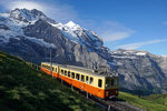 Bald ist es um die stilvollen BDhe 2/4-Pendelzüge der Jungfraubahn geschehen, die Ablösung in Form der neuen Stadler-Triebzüge steht bereit. Umso glücklicher war ich, dass ich am 09.07.2016 einen Pendelzug, bestehend aus dem BDhe 2/4 201 und dem Bt 25, kurz nach der Kleinen Scheidegg vor der Kulisse der Jungfrau aufnehmen konnte.